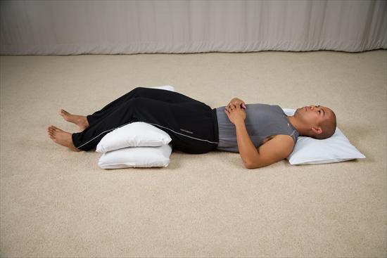 back-sleeping-with-pillow-under-knees