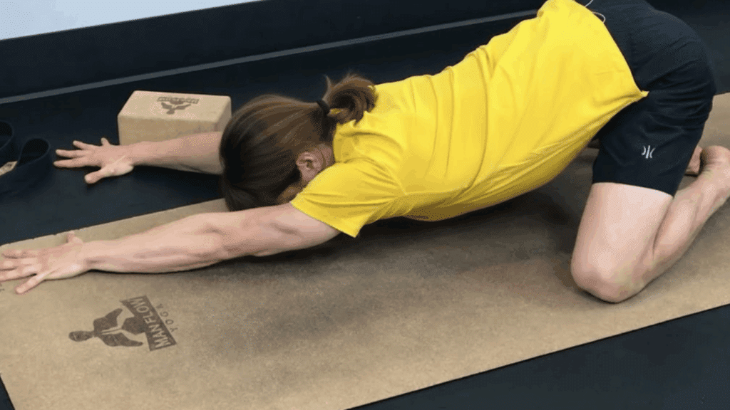 childs pose variation With side reach