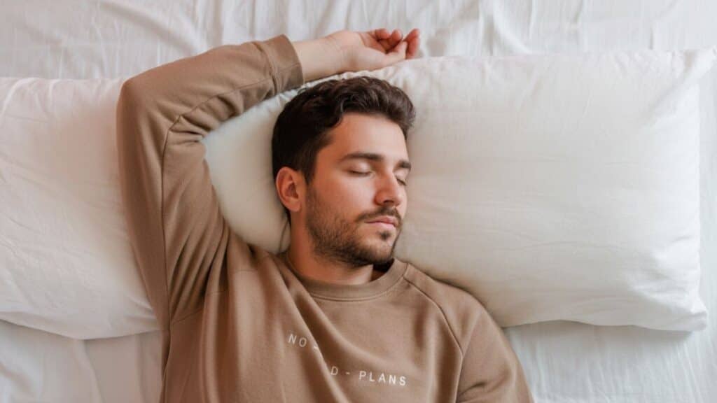 why do i sleep with my arms above my head sleep science