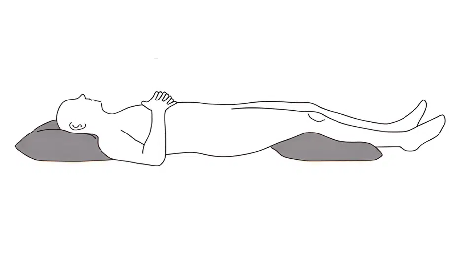 back sleeping with a pillow under the knees