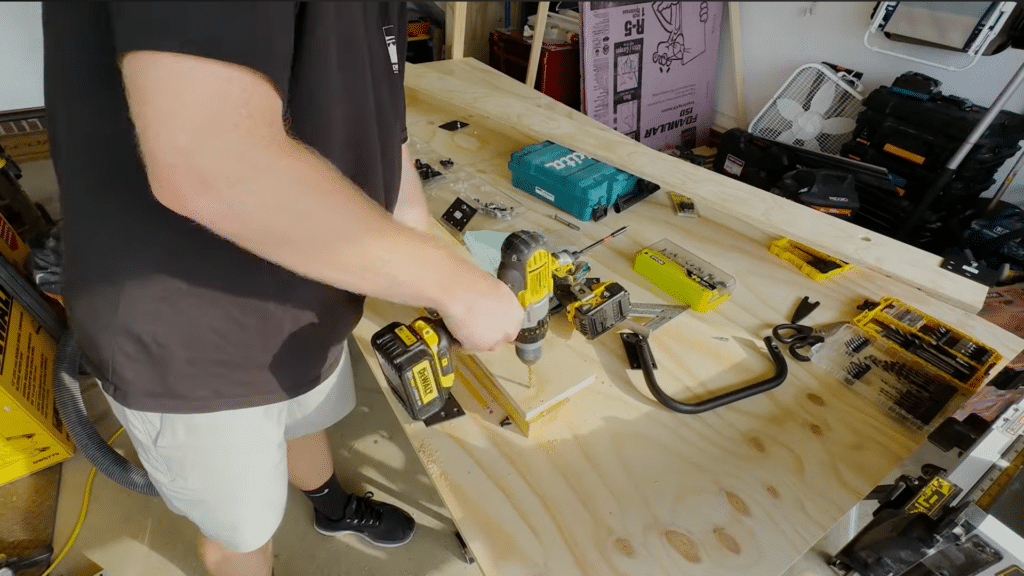 drill holes for pivot and legs