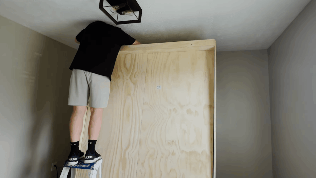 secure the bed to the wall