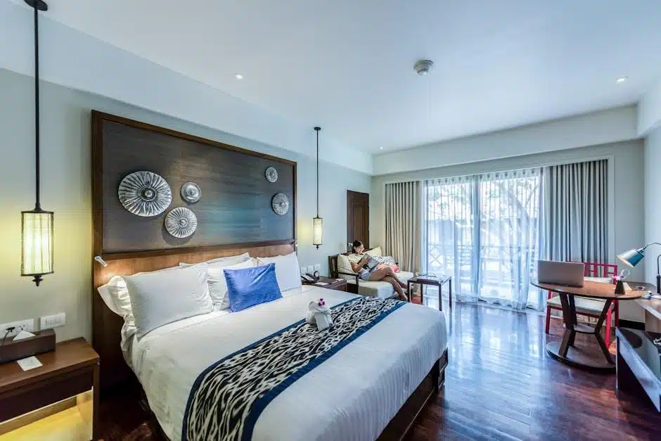 A cozy bedroom with hardwood flooring and soft bedding for restful sleep