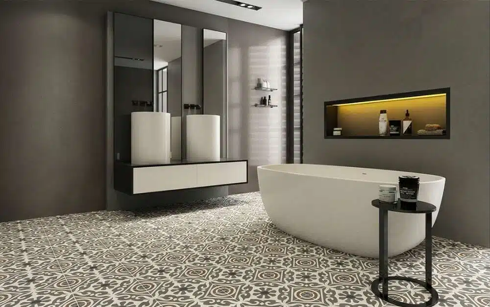 Patterned Victorian tiles from Royale Stones with plain walls, creating a cohesive bathroom look.