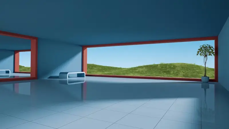 Minimalist room with large window, blue walls, and potted plant overlooking grassy landscape