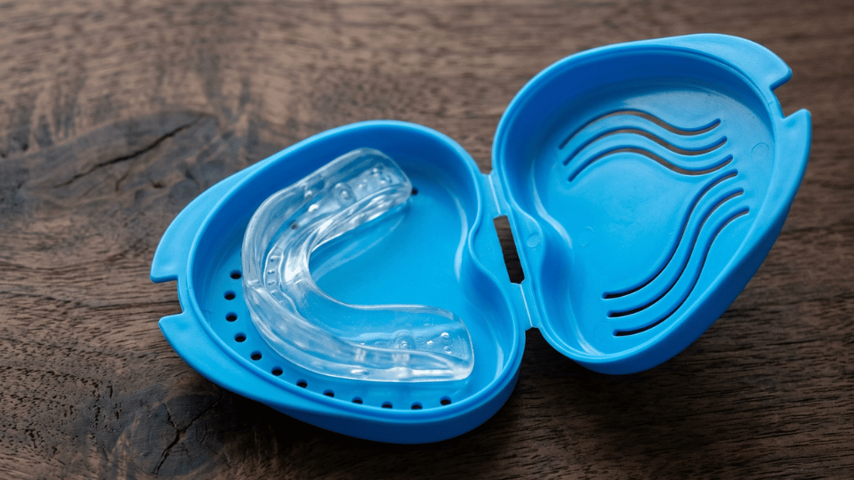 boil-and-bite sleep apnea mouthpiece stored in a protective carrying case