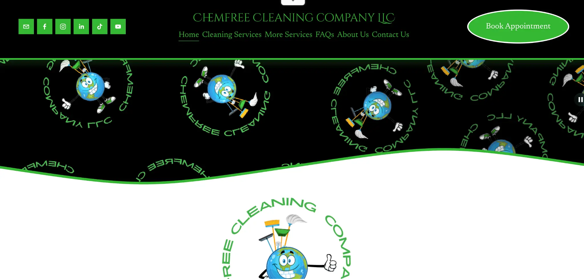 Smiling Earth mascot with cleaning tools against black and white background