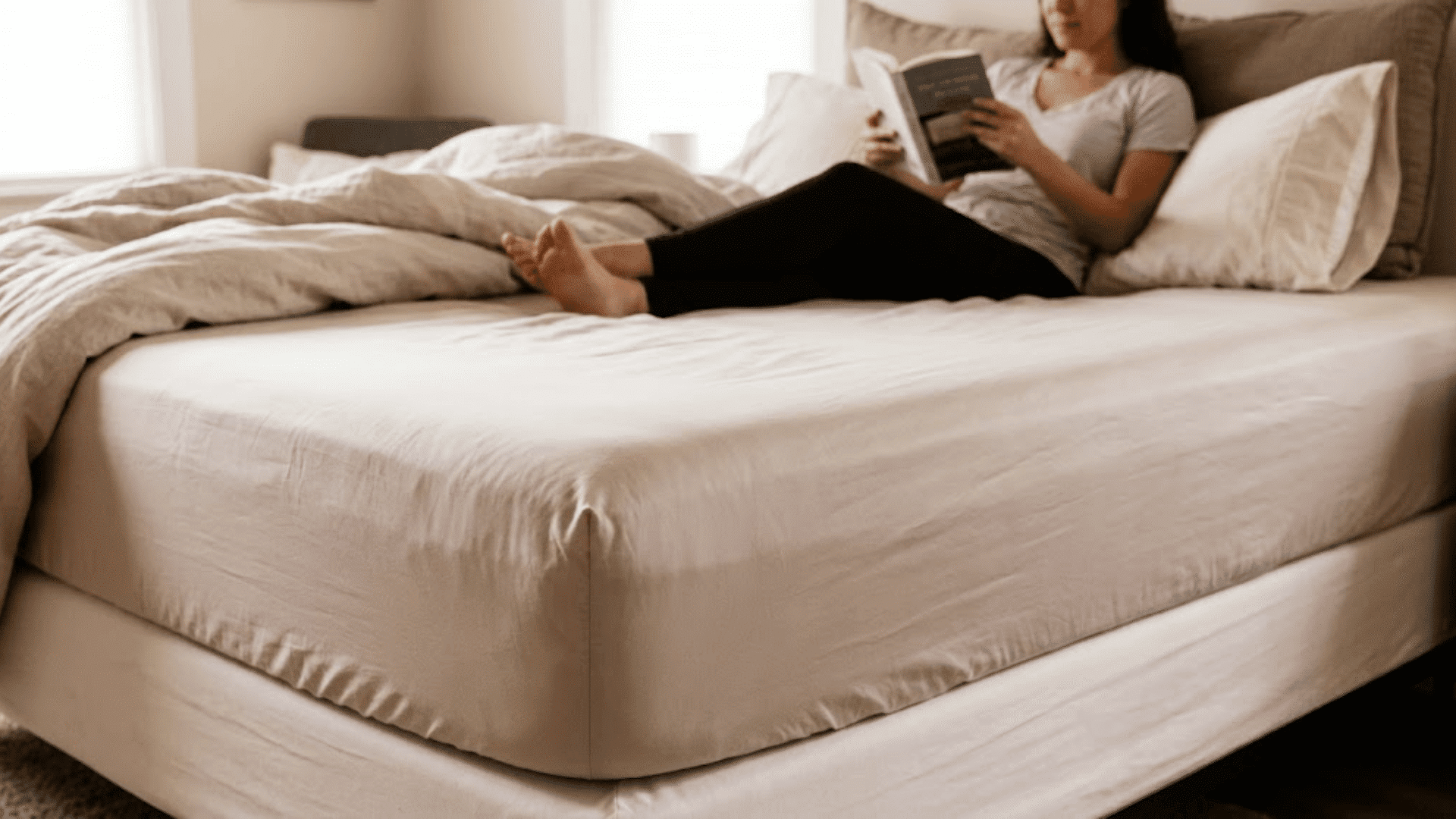 person resting on miracle sheets fitted bed with comfortable mattress setup