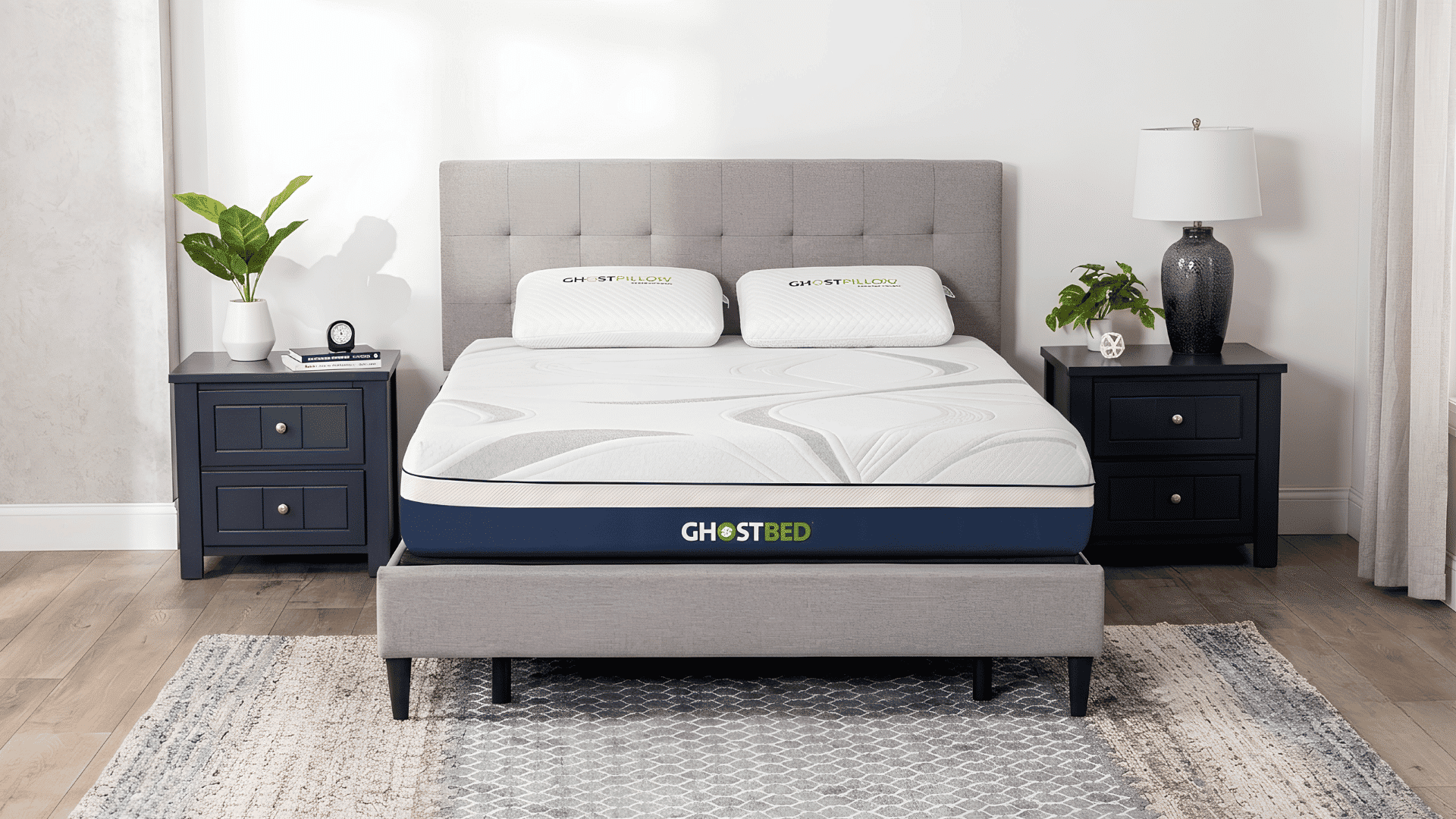 GhostBed memory foam mattress with cooling layers on an upholstered bed frame