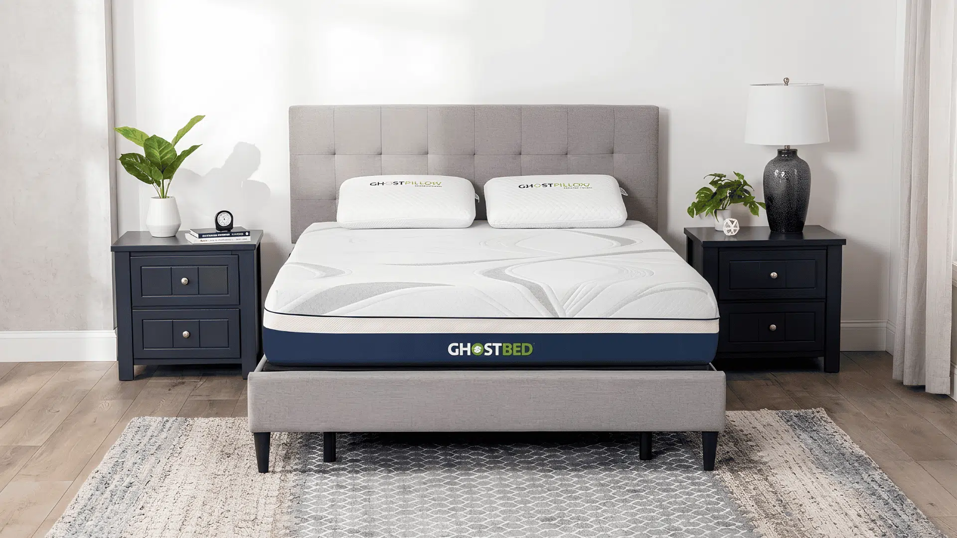 GhostBed memory foam mattress with cooling layers on an upholstered bed frame