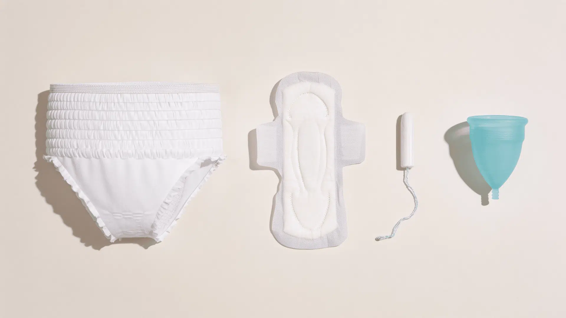 period underwear, pad, tampon, and menstrual cup side by side