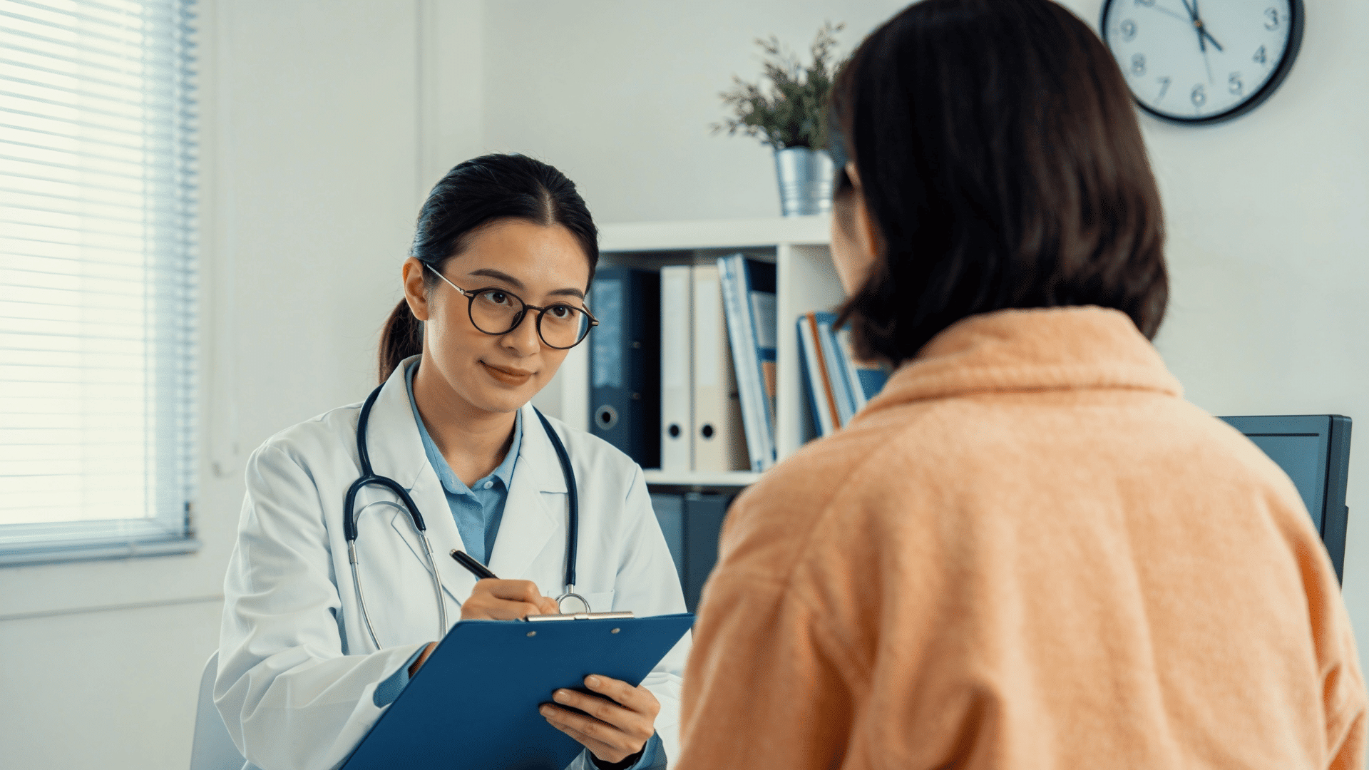 sleep technologist consulting with a patient in a clinic