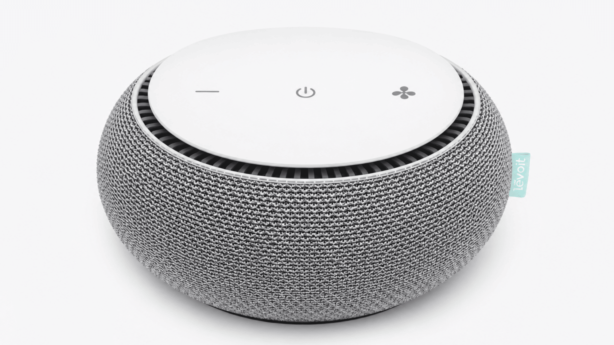 snooz smart white noise machine with fabric-covered round design, top controls, and circular speaker opening on a clean background
