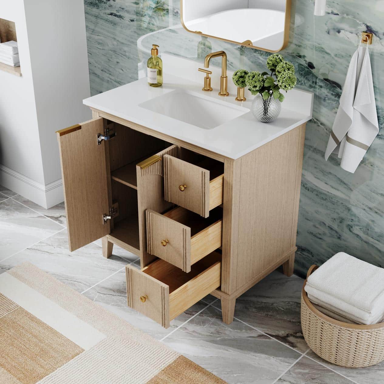 Vanity cabinet with open drawers and brass faucet in modern bathroom setting