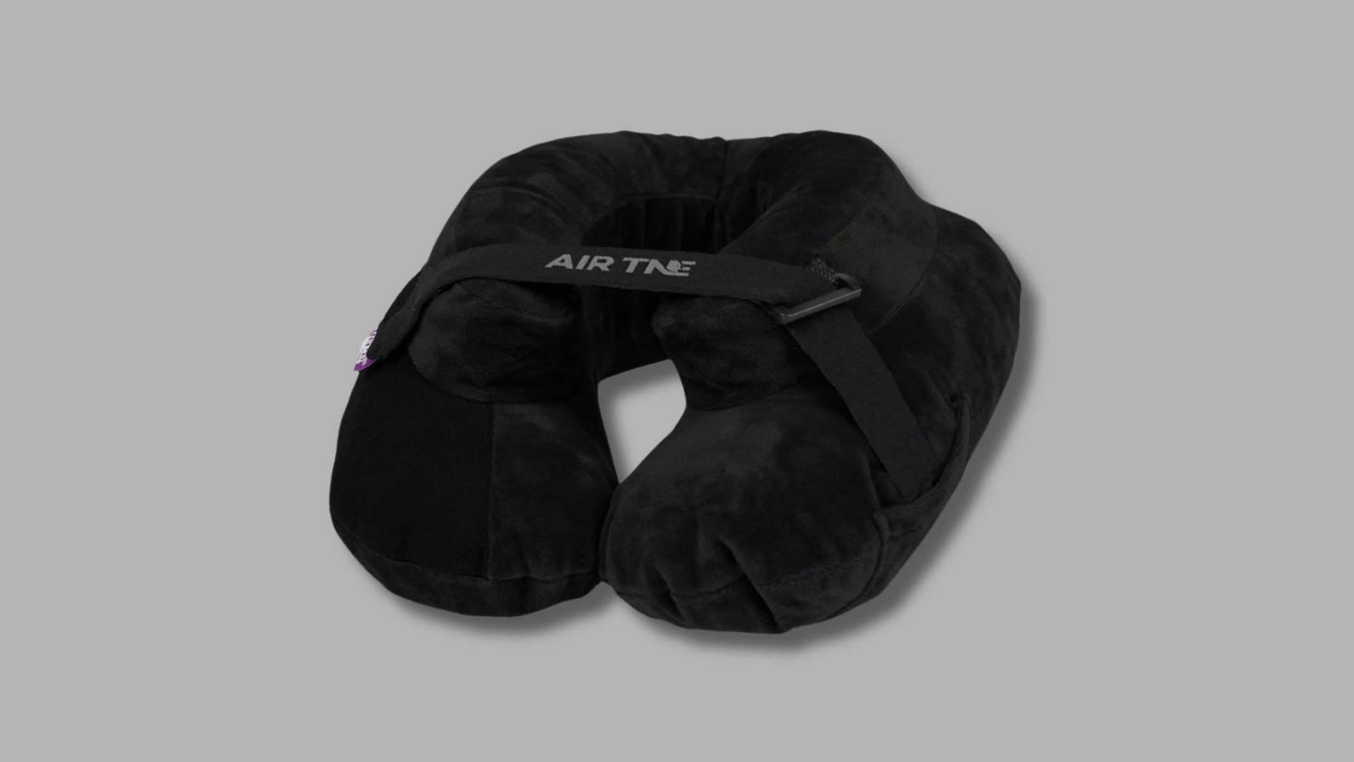 cabeau air tne travel pillow with raised side support and front securing strap