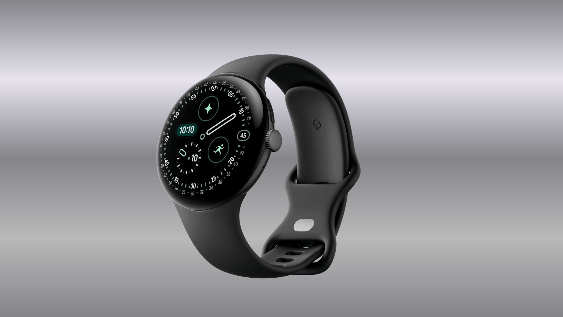 Black Google Pixel Watch 4 with round display and silicone band against a light gray background