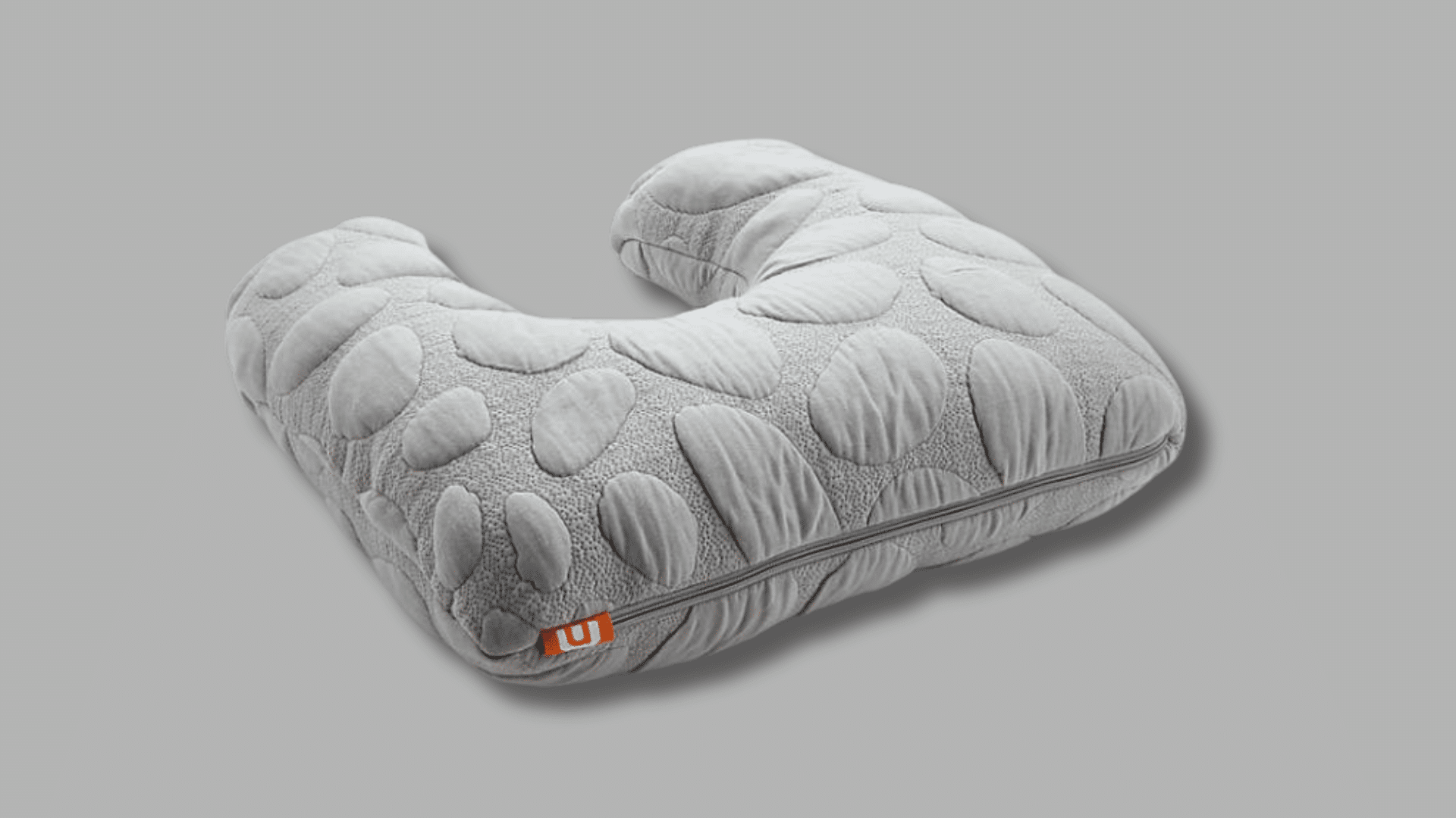nook niche nursing pillow with curved shape and breathable feeding support