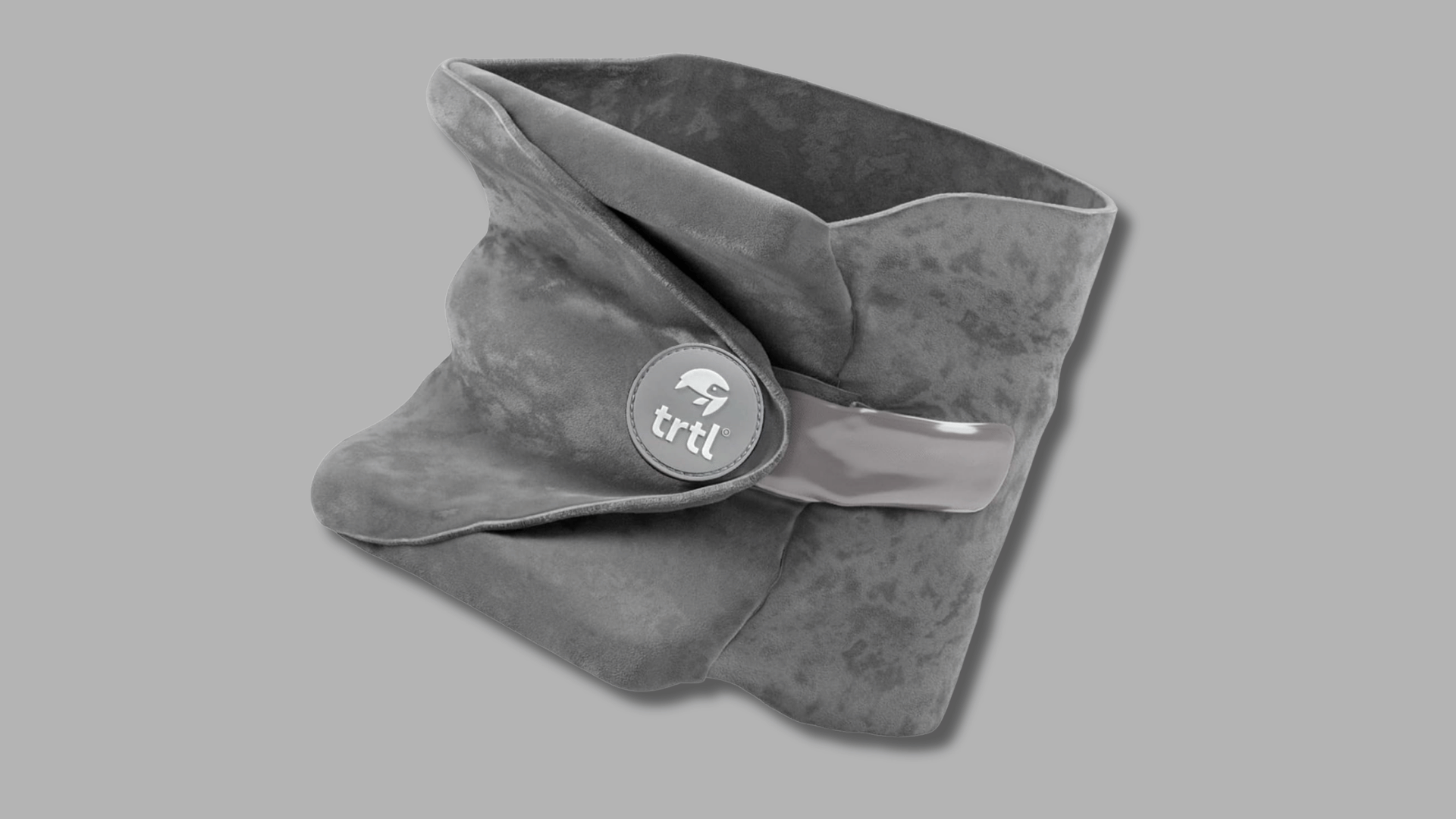 trtl travel pillow with structured side support wrapped in soft gray fabric